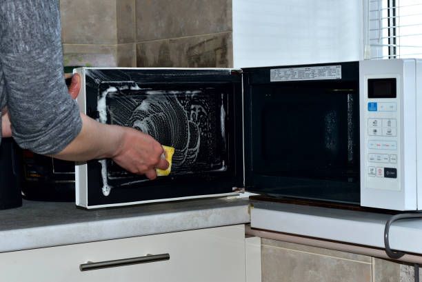maintain and clean countertop microwave